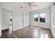 Bright bedroom with fan and hardwood floors at 216 Earl St, Daytona Beach, FL 32118
