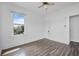 Bedroom with wood floor and natural light at 216 Earl St, Daytona Beach, FL 32118