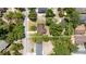 Overhead shot of the property boundary surrounded by lush trees and other houses at 220 Buena Vista St, Debary, FL 32713