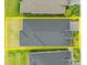 An aerial view of the home showing the roof and landscaping at 225 Mosaic Blvd, Daytona Beach, FL 32124