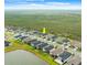 Aerial view of home nestled in a community with lush green spaces at 225 Mosaic Blvd, Daytona Beach, FL 32124