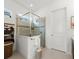 Modern bathroom featuring a glass-enclosed shower, tile accents, and neutral decor at 225 Mosaic Blvd, Daytona Beach, FL 32124