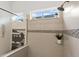 Elegant shower featuring glass enclosure, neutral tile, and modern fixtures at 225 Mosaic Blvd, Daytona Beach, FL 32124