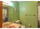A tidy bathroom featuring decorative towel bars, providing a spa-like experience at 2333 Fern Palm Dr, Edgewater, FL 32141