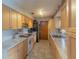 A well-lit kitchen featuring light wood cabinets and durable marble countertops at 2333 Fern Palm Dr, Edgewater, FL 32141