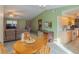 Open floor plan with dining area connected to the living room and kitchen at 2333 Fern Palm Dr, Edgewater, FL 32141
