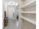 Inviting foyer with a console table, tile flooring, and an open view into the living spaces at 2337 Oxmoor Dr, Deland, FL 32724