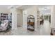 Open-concept hallway with built-in shelves and an easy transition to other living areas and ample natural light at 2337 Oxmoor Dr, Deland, FL 32724
