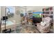 Comfortable living room featuring a fireplace, built-in bookshelves, and stylish furnishings for relaxation at 2337 Oxmoor Dr, Deland, FL 32724