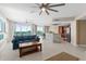 Open-concept living space with water views, a breakfast bar, stainless appliances, and modern finishes at 241 Riverside Dr # 902, Holly Hill, FL 32117