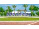 Inviting welcome sign with lush landscaping and a fountain feature, setting a serene and welcoming tone at 241 Riverside Dr # 902, Holly Hill, FL 32117