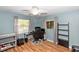 Bedroom with wood floors and natural light at 242 Linda Vista St, Debary, FL 32713