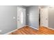 Bright foyer with hardwood floors and decorative glass front door at 242 Linda Vista St, Debary, FL 32713