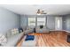 Cozy living room with neutral furnishings and hardwood floors at 242 Linda Vista St, Debary, FL 32713