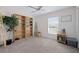 Bright, organized bedroom with bookshelves and window; a perfect home office or room at 2518 Hoptree Ln, Edgewater, FL 32141