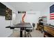 Well-organized office space with desk, shelving, and comfortable office chair at 2518 Hoptree Ln, Edgewater, FL 32141