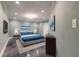 Modern bedroom with blue bedding, gray walls, recessed lighting and decor at 2628 Spruce Creek Blvd, Port Orange, FL 32128