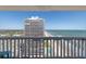 View of the condo building and Daytona Beach, from a condo balcony at 2800 N Atlantic Ave # 1715, Daytona Beach, FL 32118