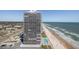 Aerial view of the condo building on Daytona Beach, with a beachside pool and ocean access at 2800 N Atlantic Ave # 1715, Daytona Beach, FL 32118