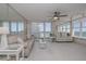 Spacious living room with ocean views, an electric fireplace, and sliding glass doors onto a balcony at 2800 N Atlantic Ave # 1715, Daytona Beach, FL 32118