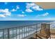 This oceanfront balcony features a seating area and endless ocean views, perfect for relaxing or entertaining at 2937 S Atlantic Ave # 1907, Daytona Beach Shores, FL 32118