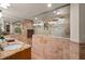 Bright bathroom featuring walk-in shower with decorative tile, granite vanity, and modern fixtures at 2937 S Atlantic Ave # 1907, Daytona Beach Shores, FL 32118