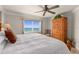 Bedroom showcasing ocean views, neutral decor, and classic wooden furnishings at 2937 S Atlantic Ave # 1907, Daytona Beach Shores, FL 32118