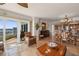 Living and dining areas with ocean views, great room floorplan, and outdoor balcony at 2937 S Atlantic Ave # 1907, Daytona Beach Shores, FL 32118