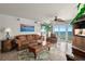 Inviting living room offering ocean views, comfortable seating, and tile flooring at 2937 S Atlantic Ave # 1907, Daytona Beach Shores, FL 32118