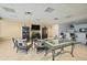 Clubhouse lounge area with kitchen and tv entertainment at 2937 S Atlantic Ave # 1907, Daytona Beach Shores, FL 32118