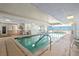 Indoor pool area featuring seating and ocean views at 2937 S Atlantic Ave # 1907, Daytona Beach Shores, FL 32118