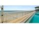Oceanfront pool deck with a serene view of the beach at 2937 S Atlantic Ave # 1907, Daytona Beach Shores, FL 32118