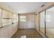 Sunroom with tile floor, white walls, and bright window lighting at 3 Fairway Ct, Deland, FL 32724