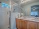 Bathroom featuring double sinks, and glass enclosed shower at 307 Stonington Way, Deland, FL 32724