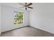 Bright bedroom with an outside view at 3214 Juniper Dr, Edgewater, FL 32141