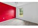 Bright bedroom featuring a large window at 3214 Juniper Dr, Edgewater, FL 32141