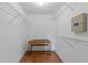 Walk-in closet with shelving and a small desk at 3214 Juniper Dr, Edgewater, FL 32141