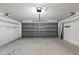 Spacious two-car garage with concrete floor at 3214 Juniper Dr, Edgewater, FL 32141