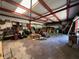 Interior of the large outbuilding, showcasing its open layout and storage potential at 326 South St, De Leon Springs, FL 32130