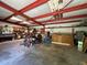 Interior of the outbuilding with metal beams and ample open space at 326 South St, De Leon Springs, FL 32130