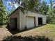 Spacious metal outbuilding for storage or workshop use at 326 South St, De Leon Springs, FL 32130