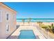 Beautiful backyard pool and patio with ocean views and beach access at 33 Ocean Shore Blvd, Ormond Beach, FL 32176
