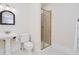 Bathroom with glass shower and traditional vanity at 33 Ocean Shore Blvd, Ormond Beach, FL 32176