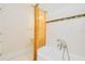 Bathroom featuring traditional vanity and tub at 33 Ocean Shore Blvd, Ormond Beach, FL 32176