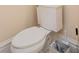 Close-up of a well-maintained toilet and bathroom accessories in a neutral-toned setting at 33 Ocean Shore Blvd, Ormond Beach, FL 32176