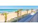 Stunning view of the beach and ocean from the property's elevated walkway at 33 Ocean Shore Blvd, Ormond Beach, FL 32176