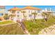 Beautiful home with lush landscaping and stairs down to the beach at 33 Ocean Shore Blvd, Ormond Beach, FL 32176