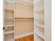Spacious walk-in closet with custom shelving at 33 Ocean Shore Blvd, Ormond Beach, FL 32176