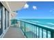 Private balcony featuring a green railing with direct ocean views, perfect for enjoying the sea breeze at 3311 S Atlantic Ave # 1704, Daytona Beach Shores, FL 32118
