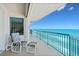 Picturesque balcony with stunning views of the ocean, seating, and a refreshing sea breeze atmosphere at 3311 S Atlantic Ave # 1704, Daytona Beach Shores, FL 32118